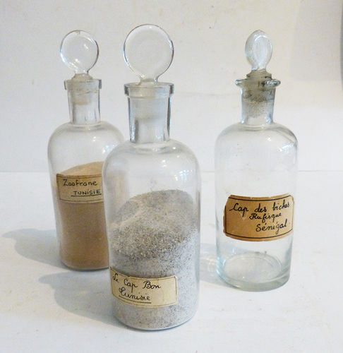 Glass bottles with world sands