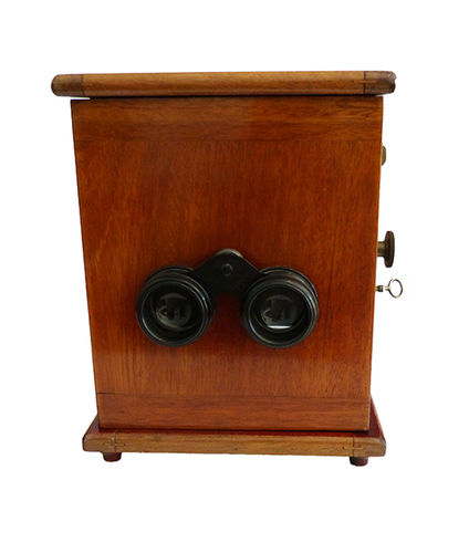 Stereoscopic wooden viewer with reel of images